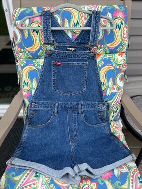 Women’s Wrangler Denim Shortalls in Blue with rolled cuff hem